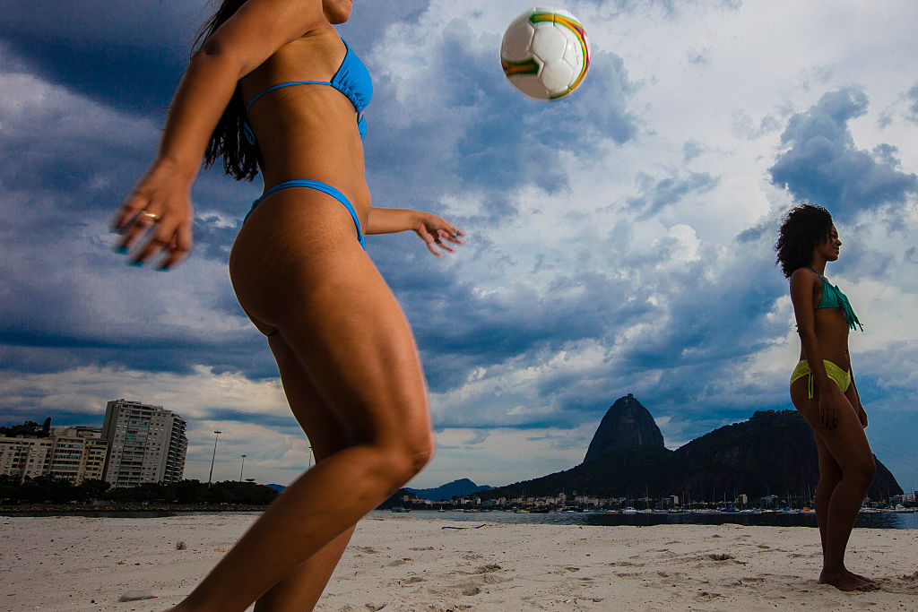 Italy's most beautiful footballer stuns in wet T-shirt with team-mate  before going for a run in tiny sports bra