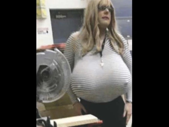 Trans teacher Kayla Lemieux is seen in new picture walking with her giant Z- cup prosthetic breasts after parents at Nora Frances Henderson Secondary  School fume over her hiring