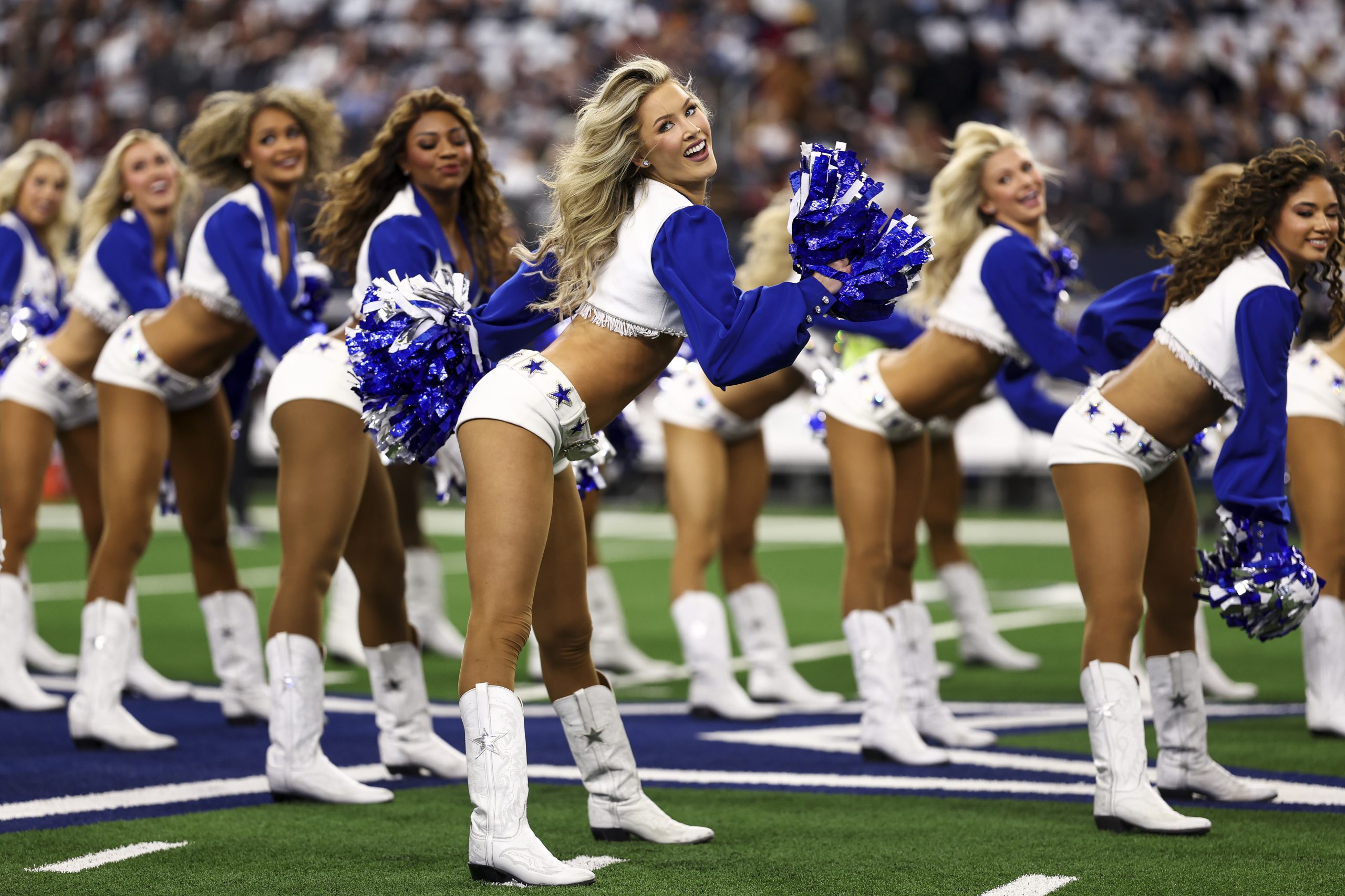 Dallas Cowboys cheerleader rookies react emotionally to visit in the locker room