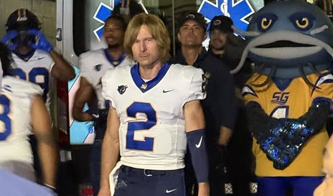 Glen Powell, aka Chad Powers, is booed by Georgia fans during the halftime shootout