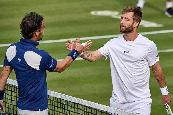 We've Got A Tense Tennis Handshake With A Side Of French Expletives