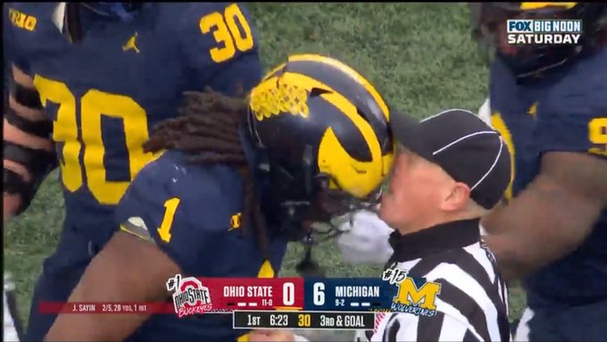 Michigan Defender Appears To Headbutt Referee, Officials Call It A 15-Yard Oopsie