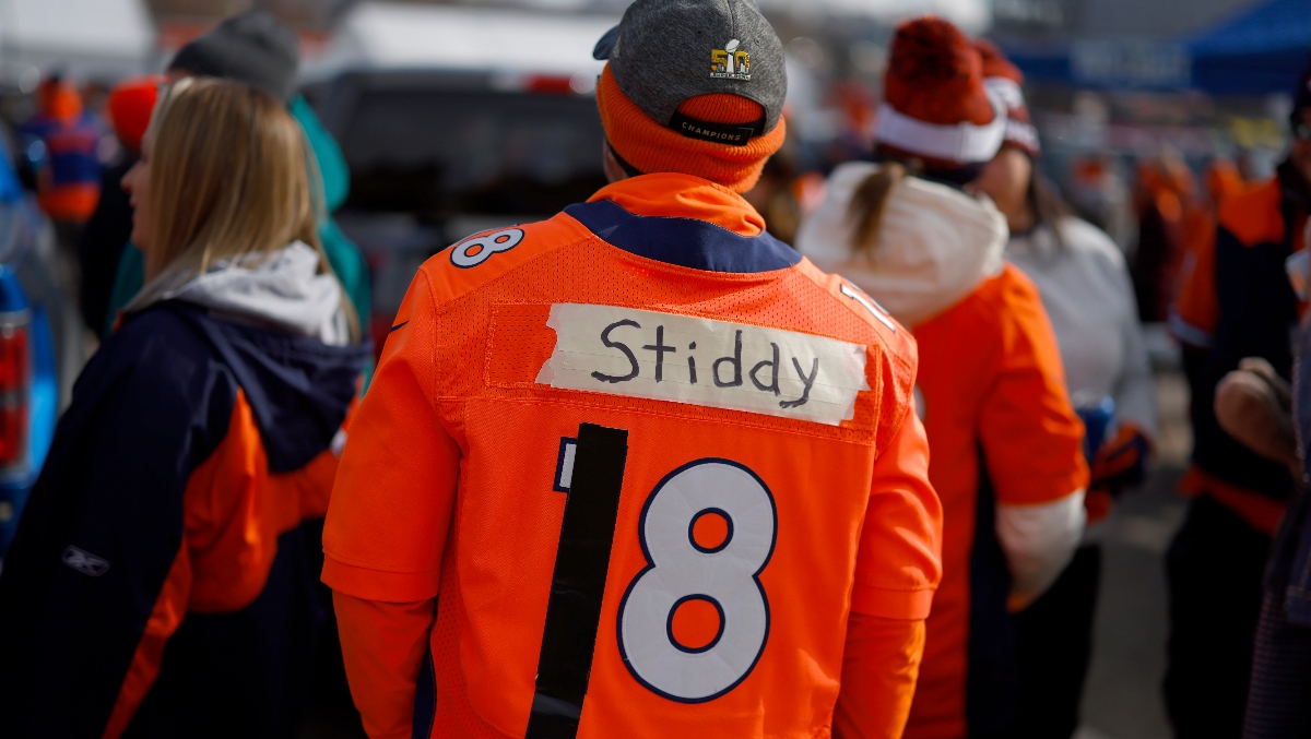 Broncos Fan Knocked Out Cold By Patriots Fan Leaving Mile High After Denver's Loss: WATCH