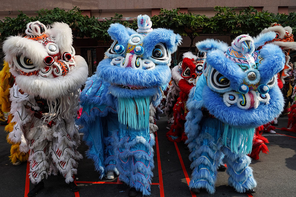WATCH: Thai Police Bust Crook Using Giant Lunar New Year Lion Costume